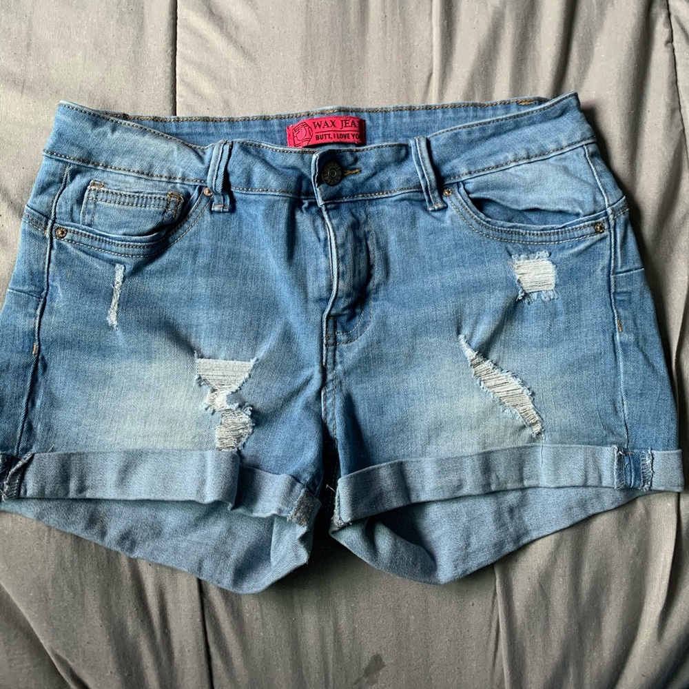 light blue ripped jeans